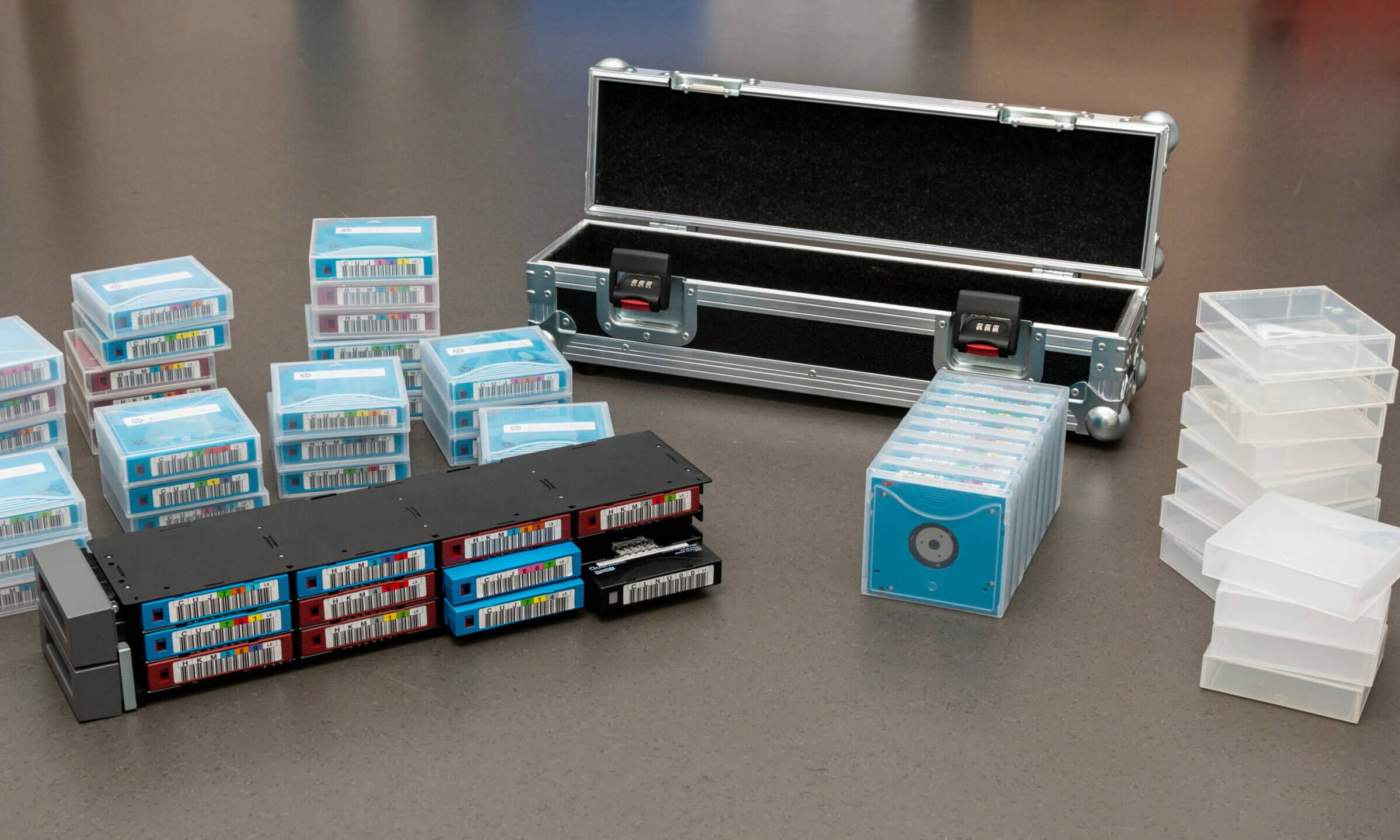 Marbach, Germany-March 06.2021:Data backup Tapes for professional data backup (long-term archiving) lie next to a lockable transport case